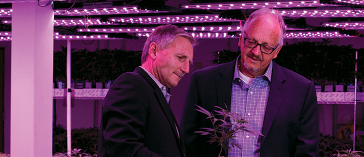 John Lord and Michael Raisch in the LivWell grow room