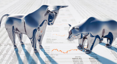Silver Bull and Bear on Newspaper