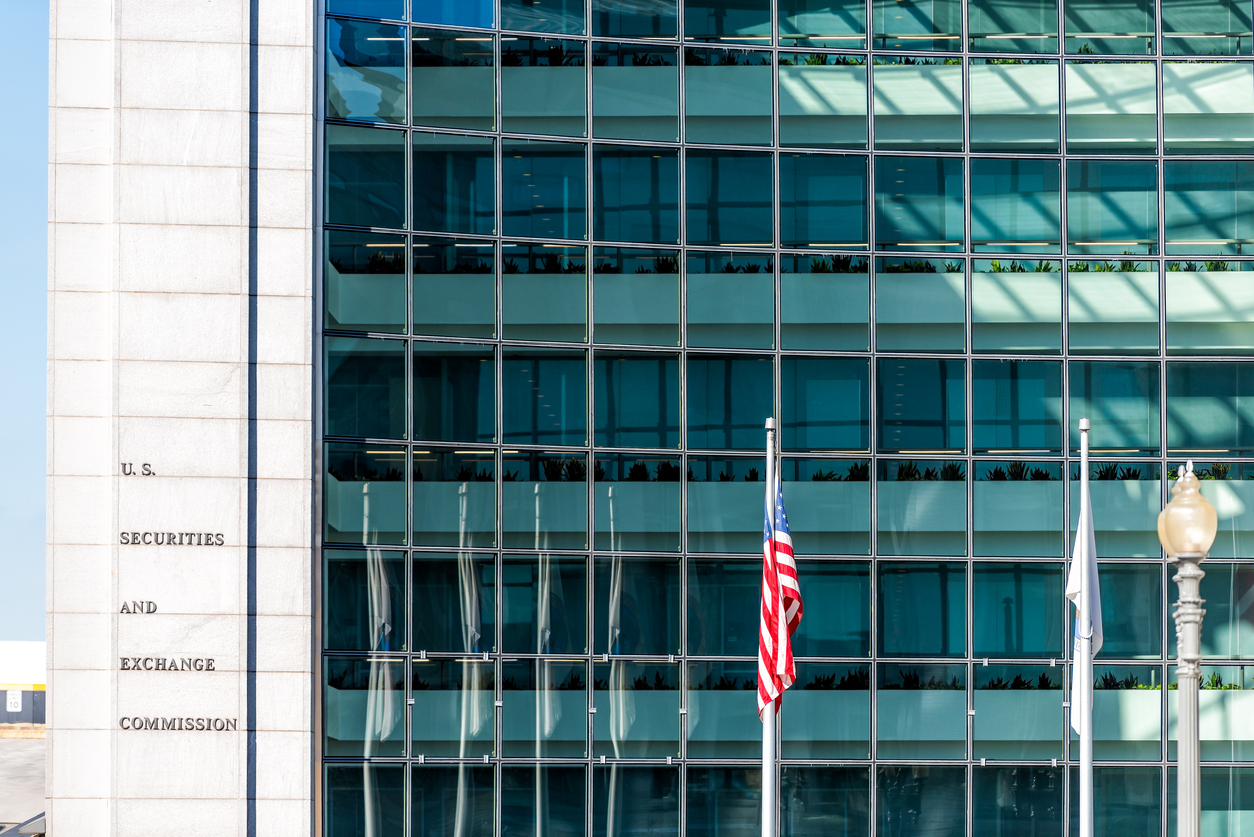 US United States Securities and Exchange Commission SEC entrance architecture modern building sign, logo, american flag, glass windows