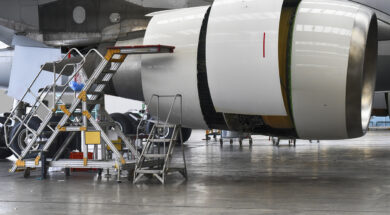 Aircraft Jet engine maintenance in airplane hangar