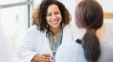 Caring doctor listens to patient