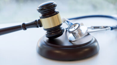 Gavel and stethoscope. medical jurisprudence. legal definition of medical malpractice. attorney. common errors doctors, nurses and hospitals make