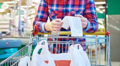 Woman housewife looking check in store