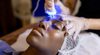 Woman at the spa getting an ultrasound treatment on her face