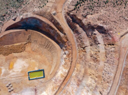 AERIAL VIEW OF OPEN PIT MINE WITH ENVIRONMENTAL REMEDIATION