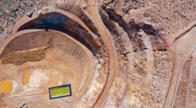 AERIAL VIEW OF OPEN PIT MINE WITH ENVIRONMENTAL REMEDIATION