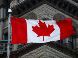 canada flag on parliament