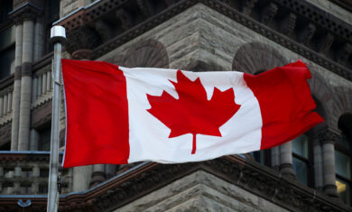 canada flag on parliament