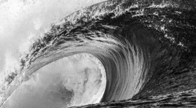 Close up of a huge and powerful wave breaking, Tahiti black and white