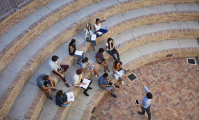 Students having class in outside auditorium