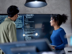 Involve People in Decisions to Improve Performance, Efficiency, and Productivity in Software Development. Diversity of team software developer on a software project discussion to define project timeline in a tech business office.