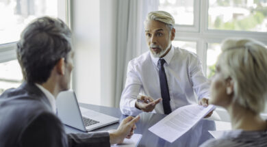 Business professionals negotiating
