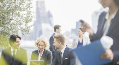 Business people talking outdoors