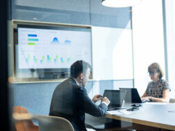 Potential for Faster Business Growth and Business Scalability with Strategic Plan. Business Development executive in a meeting room and using a laptop computer during a business strategic meeting in a business office. Cooperate Business.