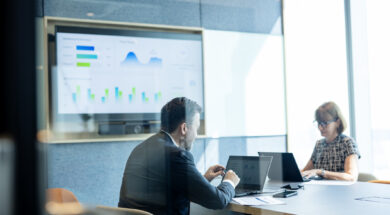 Potential for Faster Business Growth and Business Scalability with Strategic Plan. Business Development executive in a meeting room and using a laptop computer during a business strategic meeting in a business office. Cooperate Business.