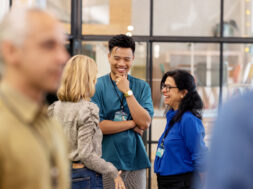 Multiracial business people talking before the seminar