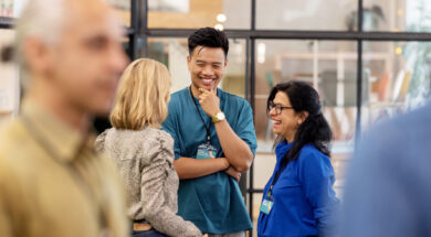 Multiracial business people talking before the seminar