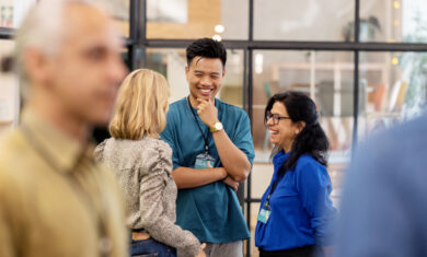 Multiracial business people talking before the seminar