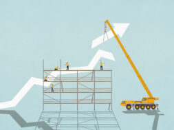 Construction workers on scaffolding below crane assembling ascending graph arrow