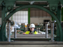 Male engineer and tablet working at manufacturing factory.