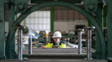 Male engineer and tablet working at manufacturing factory.