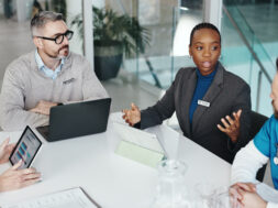 Doctors, nurses and discussion with tablet in clinic for medical results, health stats or feedback. Above, people or medicine team with screen for hospital budget, surgery planning or healthcare cost