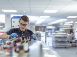 Apprentice engineer in medical electronics machinery manufacturing factory