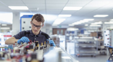 Apprentice engineer in medical electronics machinery manufacturing factory