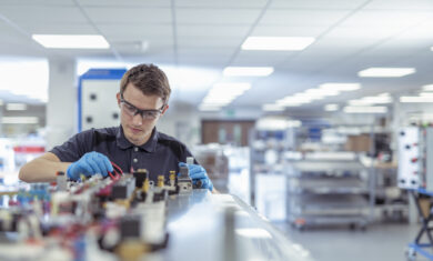 Apprentice engineer in medical electronics machinery manufacturing factory