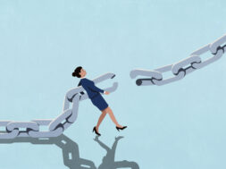 Businesswoman attempting to reconnect broken chain against blue background