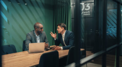 Business consultants reviewing strategy in contemporary office setting