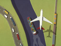 Airplane flying over commercial semi-trucks, train and container ship