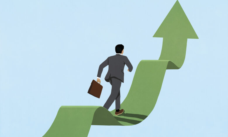 Businessman running up ascending green arrow ribbon against blue background