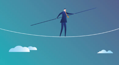 Business man walks on the wire rope